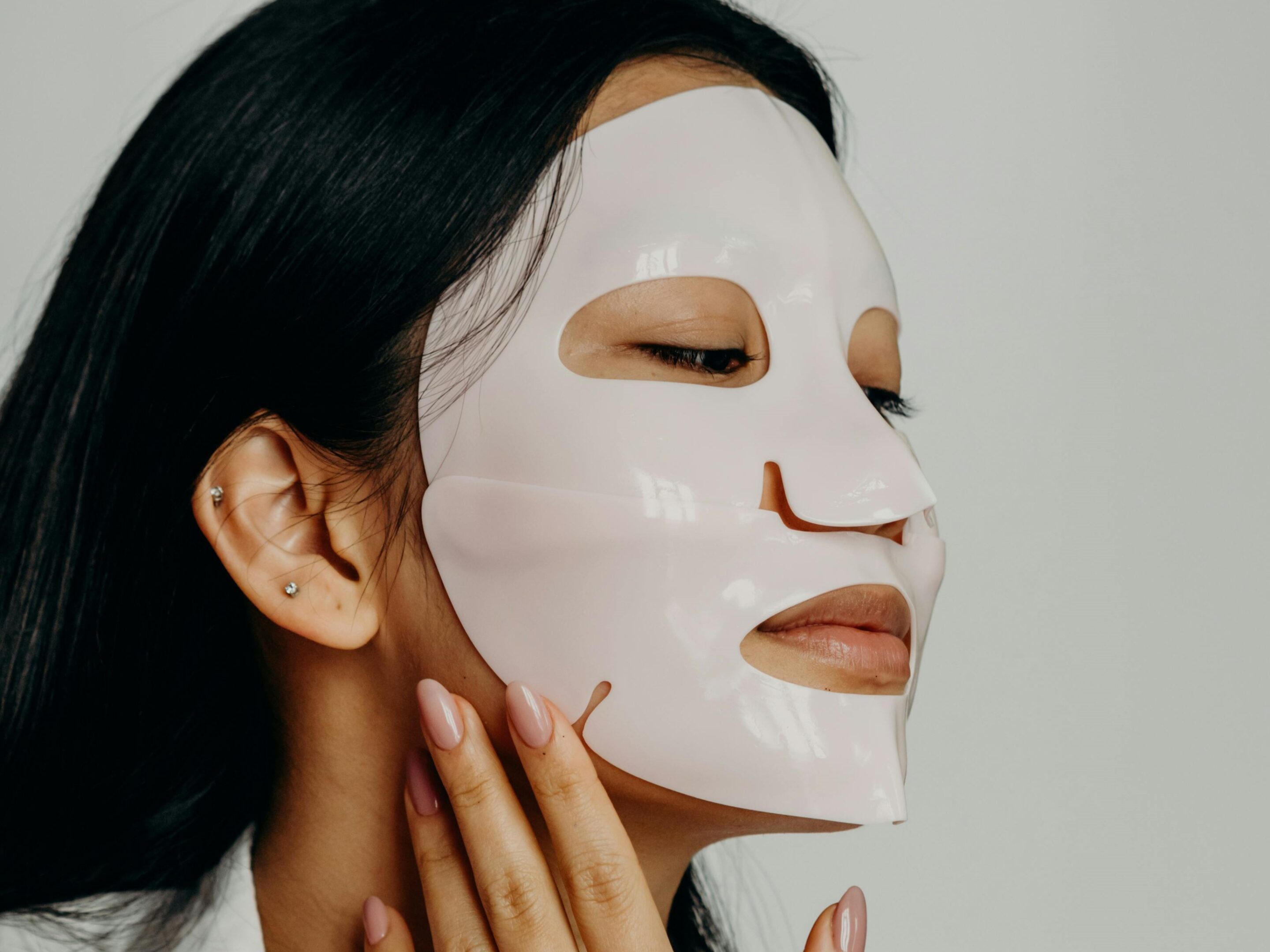 Woman Doing Skincare Routine for Sensitive Skin - gel sheet mask